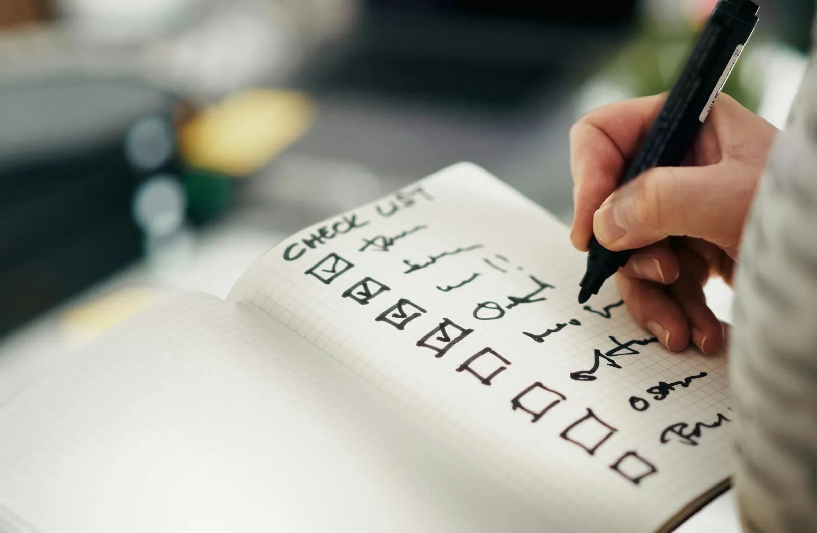 Items being checked off a paper checklist