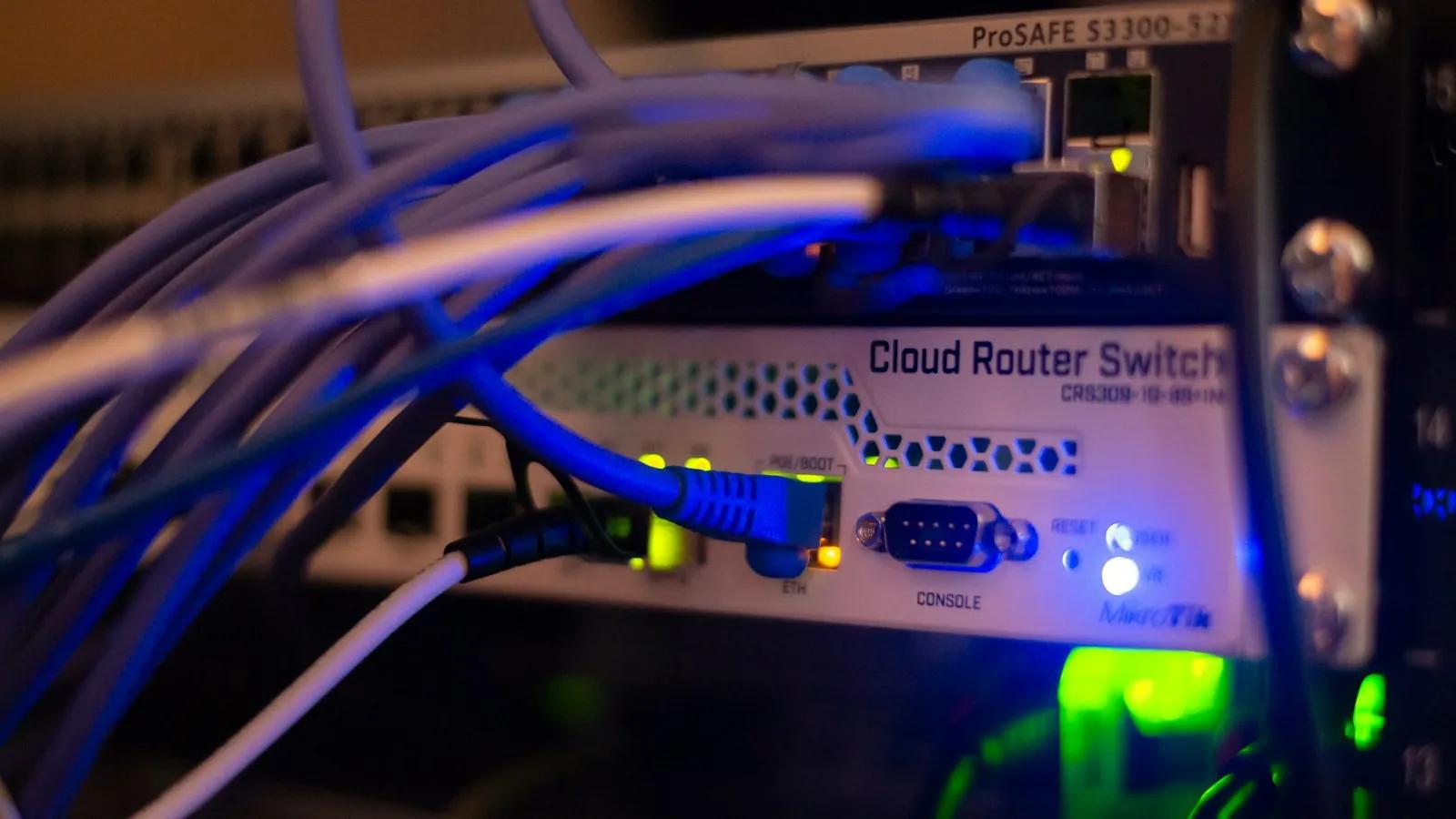 Close-up of network cables plugged into a switch