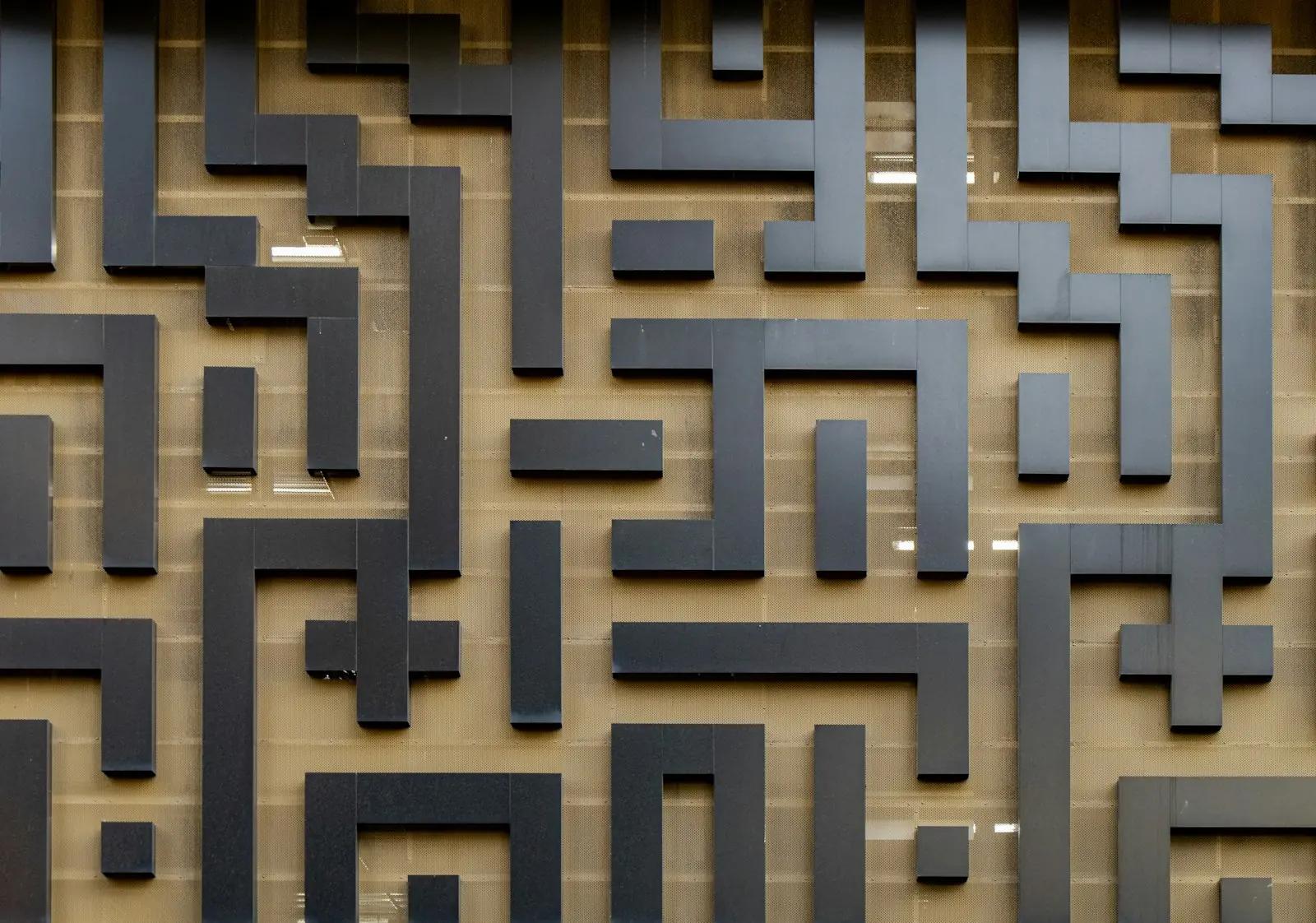 Black maze walls seen from above
