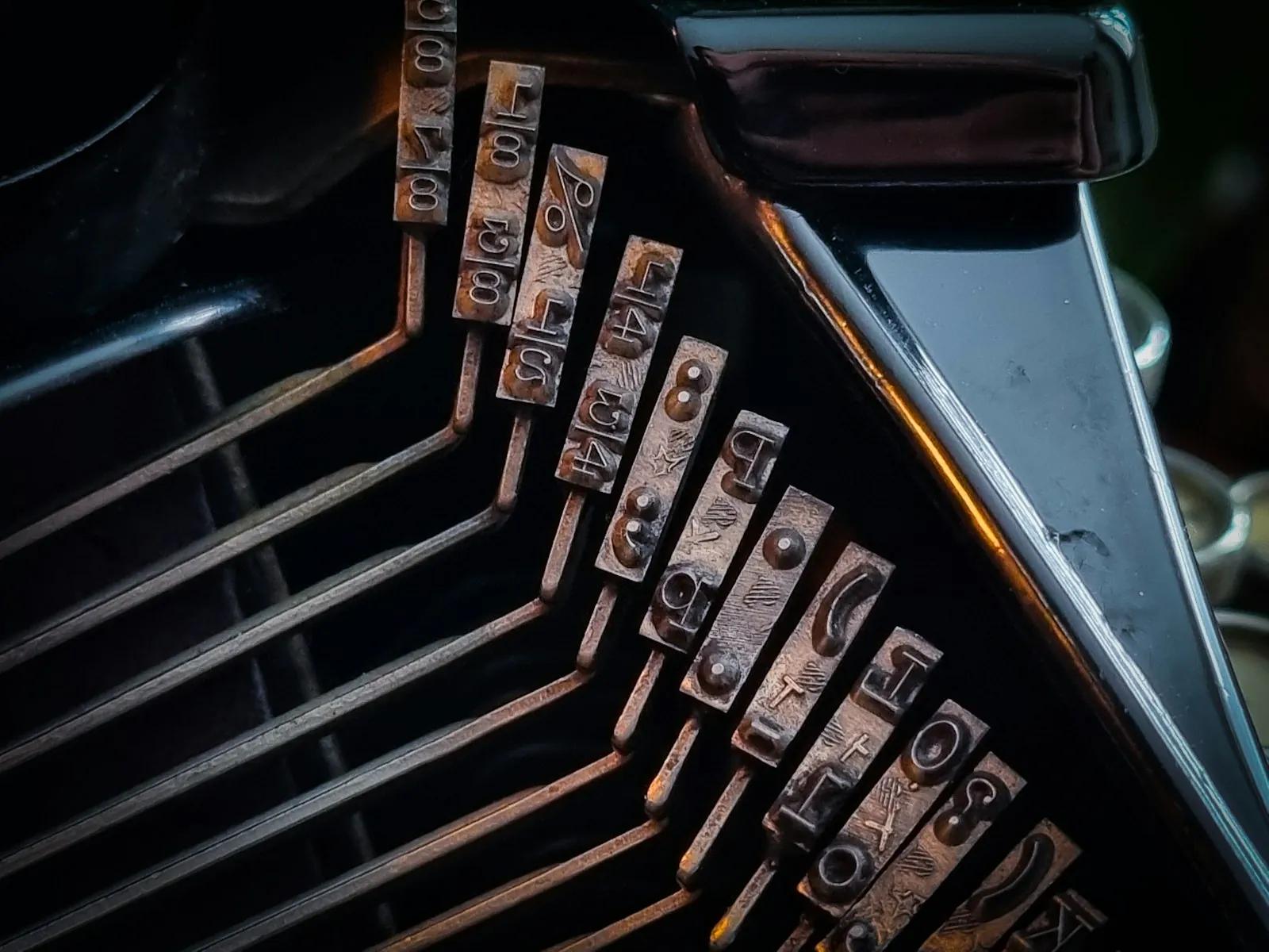 Close-up of typewriter type bars