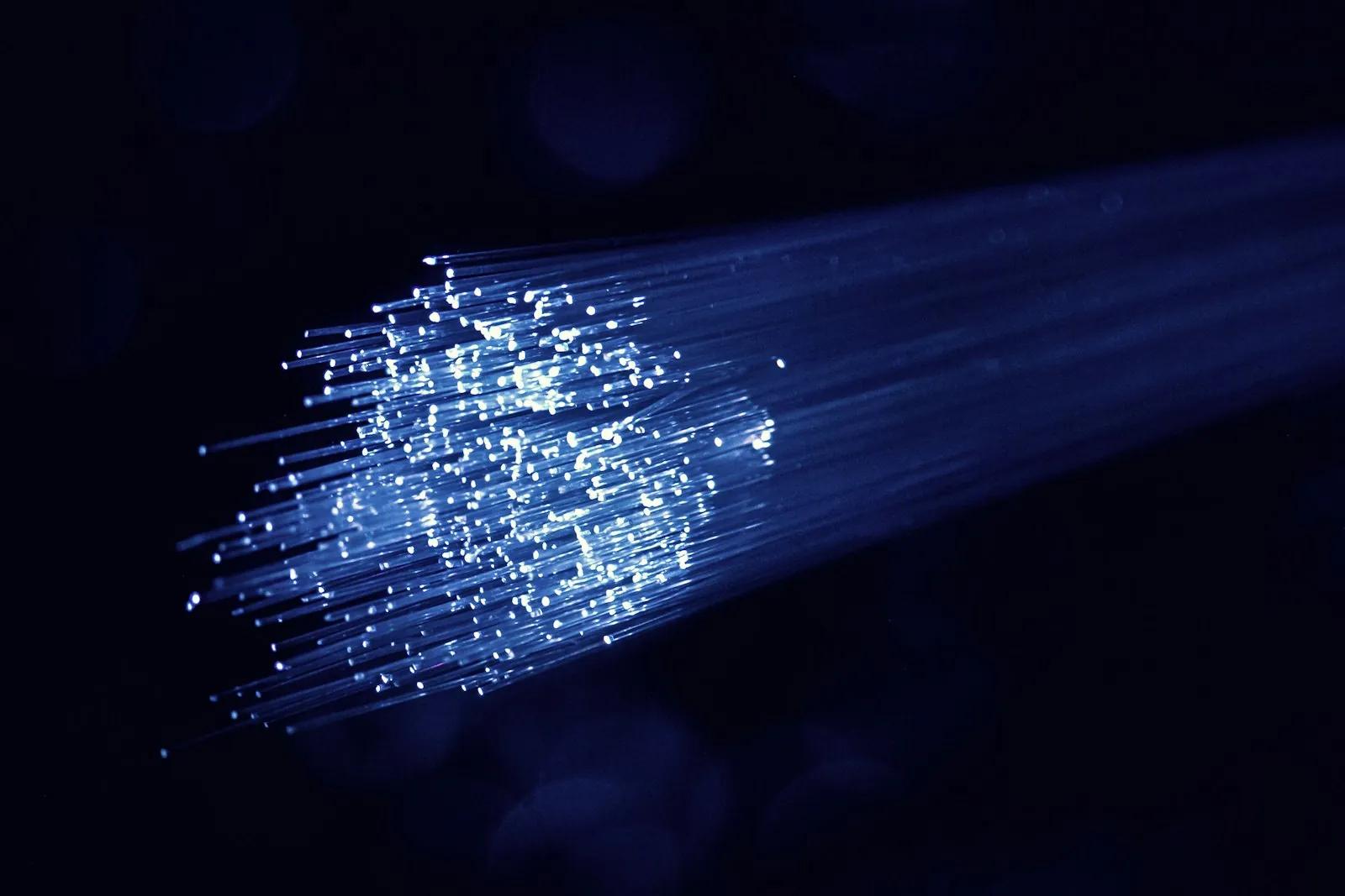 Points of blue and white light from fiber optic strands