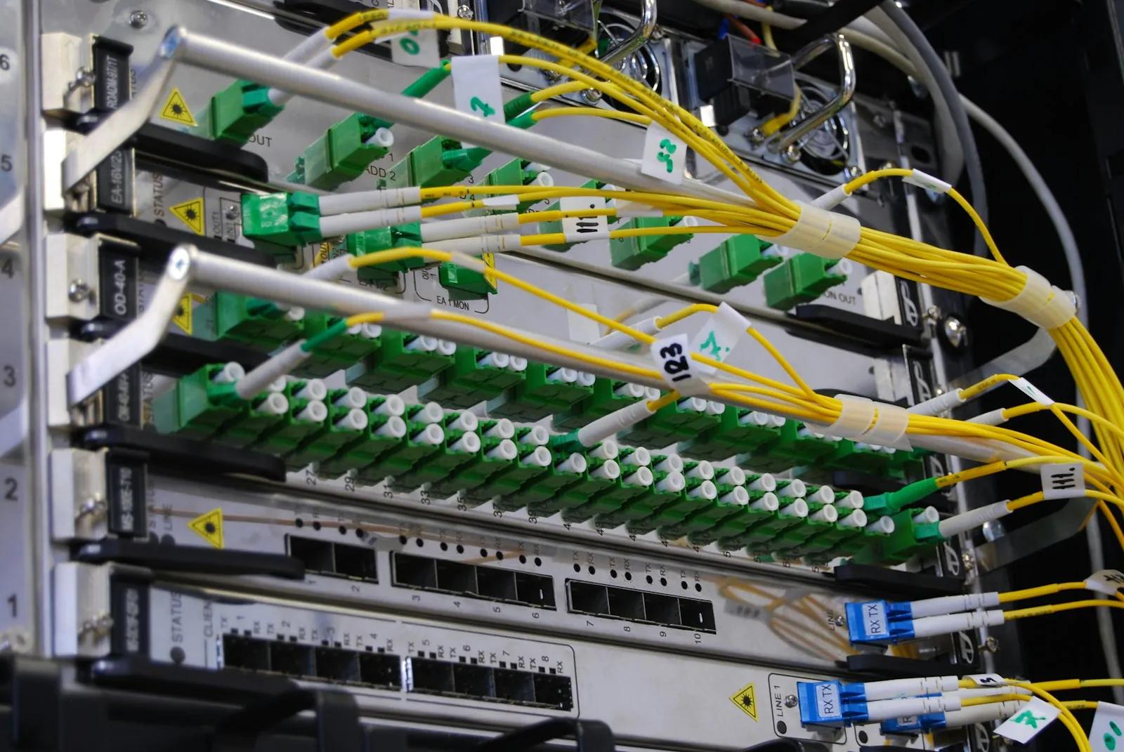Fiber optic cables connected to a network switch