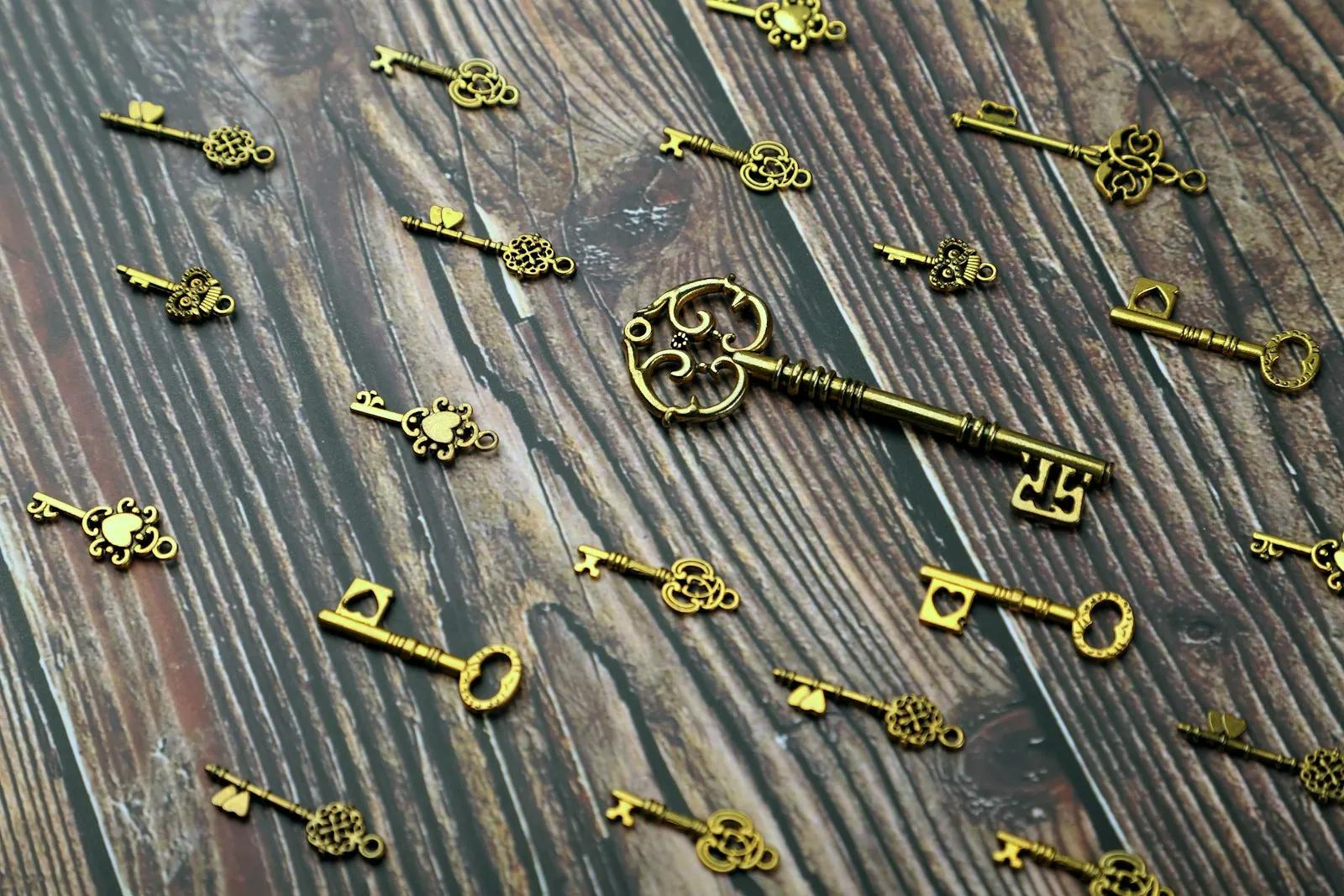 Brass skeleton keys scattered on a wooden surface